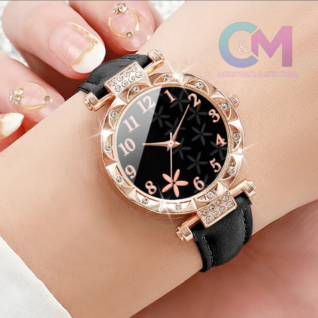RELOJ ESFERA  CROMADO ORO DE CORREA COLOR NEGRO Y ESTRELLA ENTRE NUMEROS 